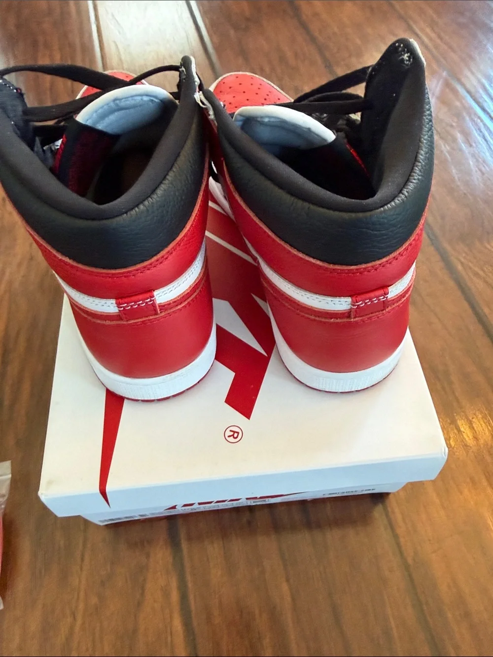Air Jordan1 Retro High OG Sneakers in White, Red and Black